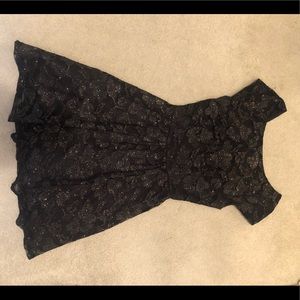 Black dress with gold glittery details